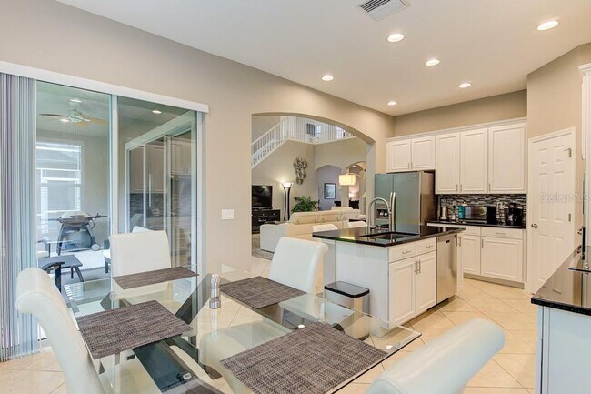 Building Photo - 4/3 Stylish and Spacious 2-story home with...