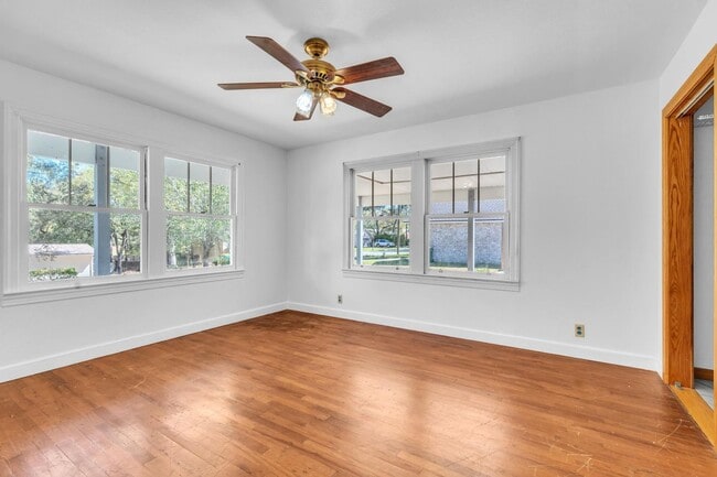 Building Photo - Charming home with large garage & attached...