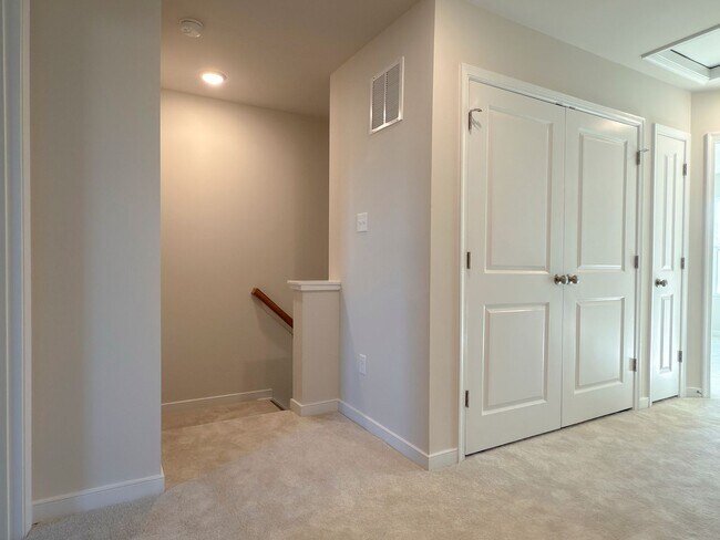 Building Photo - Modern New 3BR Townhome in Hancock Village with Luxury Finishes