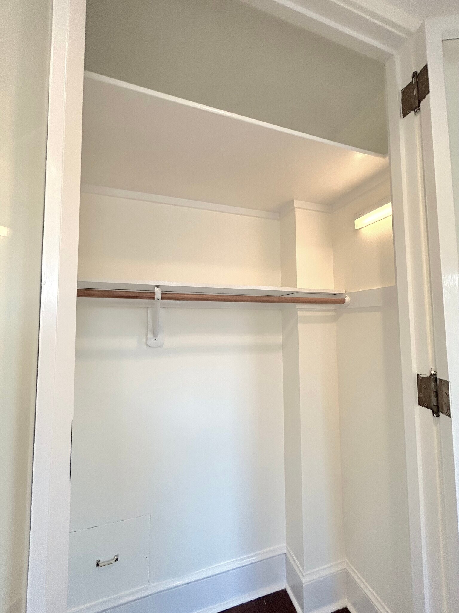 Bedroom closet with light on - 301 M St NW