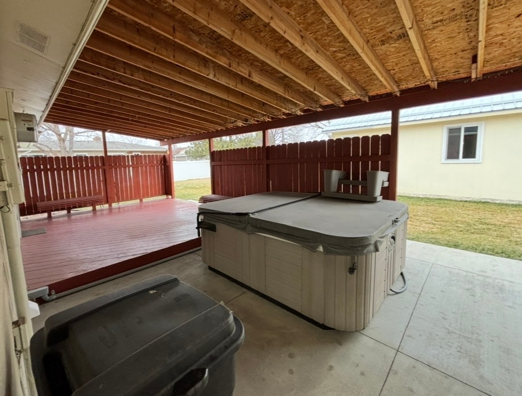 Currently a hot tub on the back porch (inoperable), will be hauled off spring/summer of 2026 - 3227 Lynn Ave