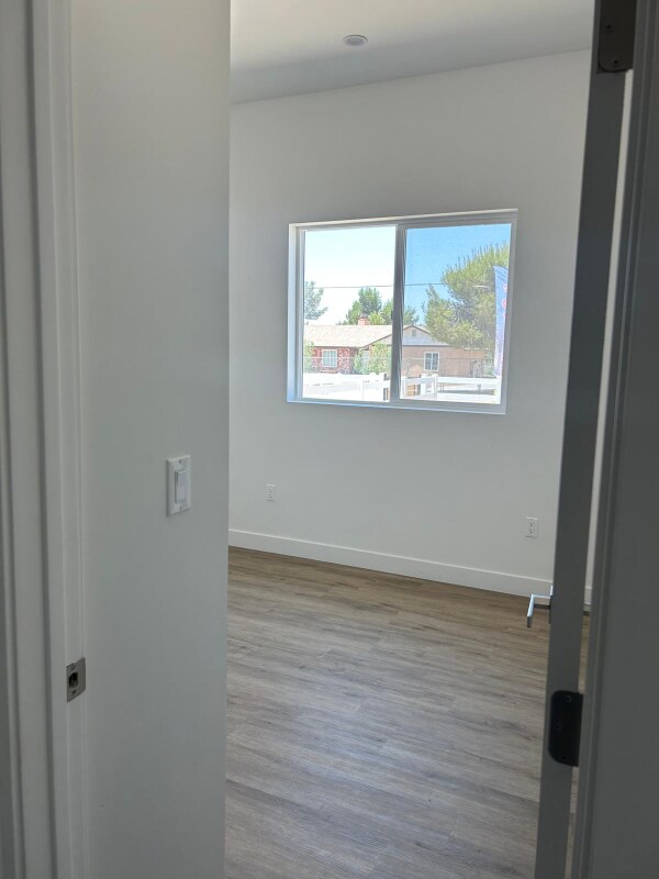Building Photo - 9232 E Ave T 6