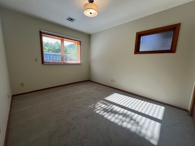 Building Photo - Gardener's Dream!  2 Bedroom house on quiet corner lot