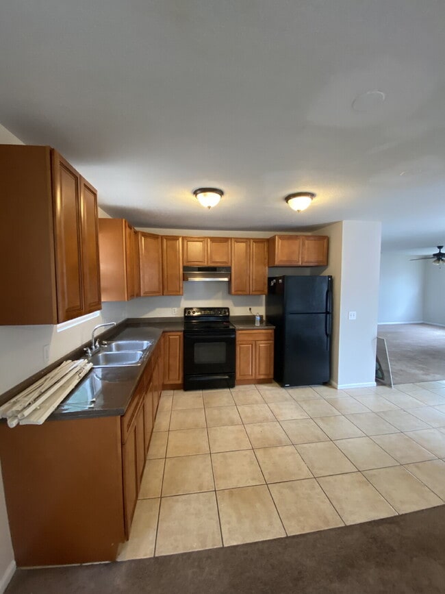Building Photo - "Spacious 4-Bedroom Home with 2 Full Baths...