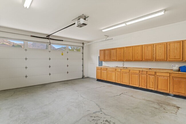 Building Photo - 3-bedroom, 2-bathroom home featuring an op...