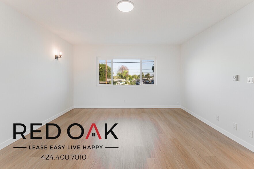 Building Photo - 14807 Normandie Ave