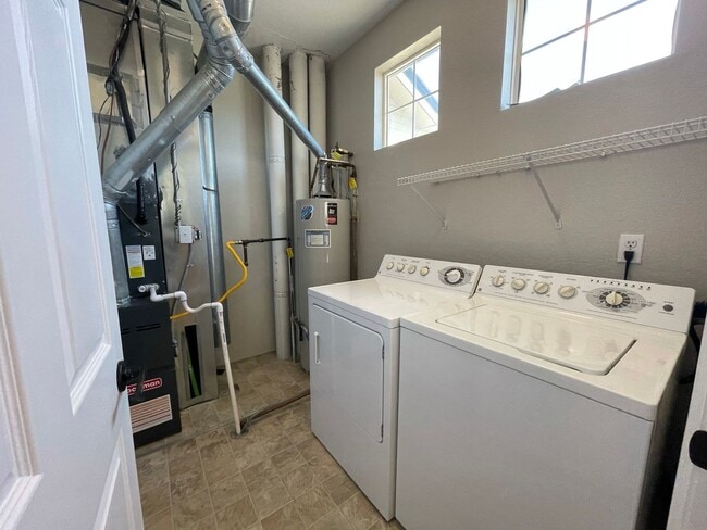 Building Photo - Built to Spoil! Gated Community in Denver with attached Garage!