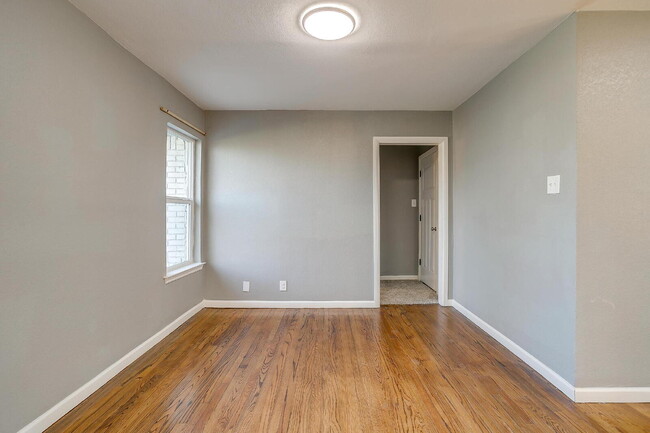 Building Photo - "Spacious 4-Bedroom Gem with Granite Touch...