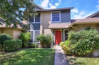 Building Photo - Stately 2 Story Condo In North Austin Loca...
