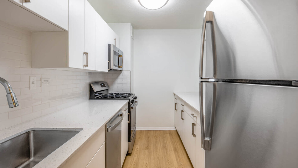 Kitchen with Stainless Steel Appliances - Emerson Place