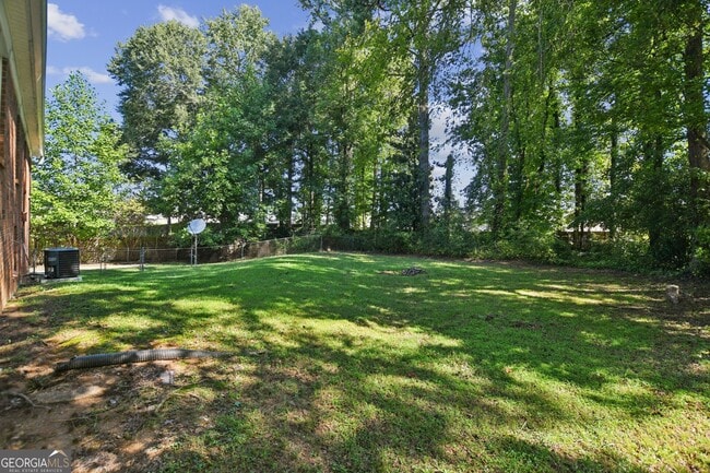 Building Photo - 5659 Whispering Pines Rd