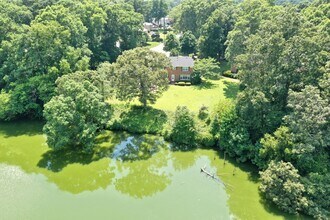 Building Photo - Reduced & Ready NOW! WATERFRONT Home in Wi...