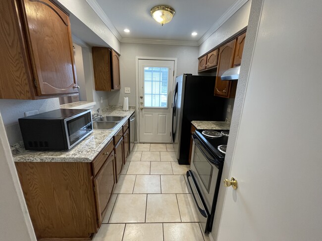 Building Photo - The Gardens Condos