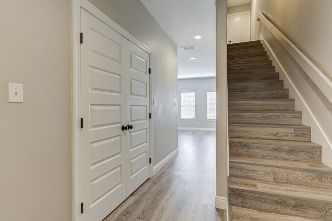 Building Photo - Stunning 3 Story Town-Home near Texas Tech...