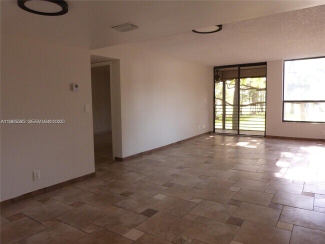 Building Photo - 6751 N University Dr