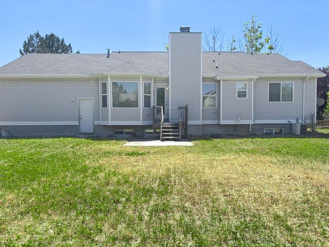 Building Photo - Spacious 5-Bedroom Home in Stansbury Park ...