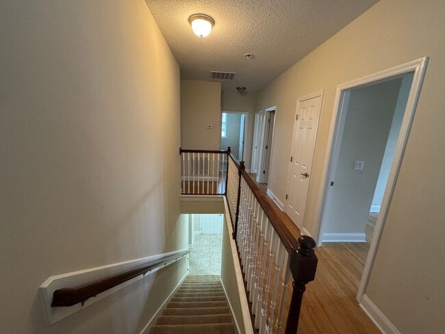 Building Photo - Move in Ready! Four Bed Three Bath Two Story Home. Amenities. Garage. Washer/Dryer. Top Rated Sch...