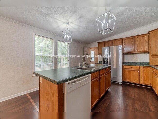 Building Photo - A COUNTRY DREAM! 4BR, 2BATH MANUFACTURED HOME, $1650./month