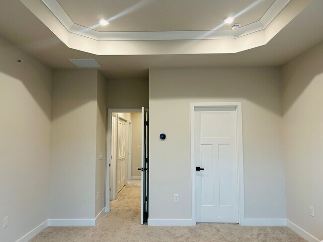 Building Photo - New Construction • 4 BR • 2 Full / 2 Half BA • End Unit Townhome in Village Town – Fayetteville’s...