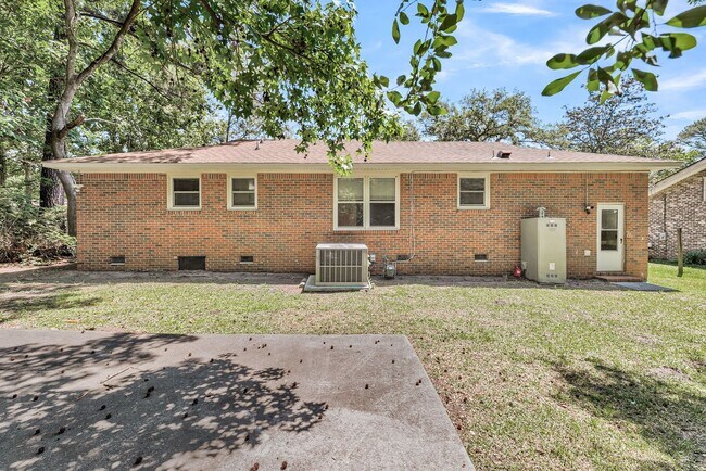 Building Photo - Solid Brick Home on Nearly Half an Acre — Space, Privacy & Charleston Convenience