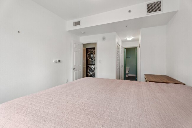 Building Photo - Modern 2-Bedroom Condo with Premium Amenit...