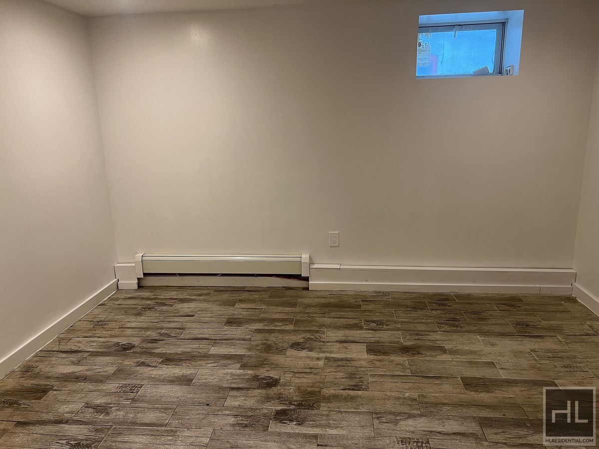 Building Photo - 2BR 1BA Lower Level All Utilities Included w/ Laundry Beside Highland Park