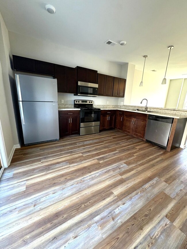 Building Photo - Beautifully Remodeled Two-Story Townhome