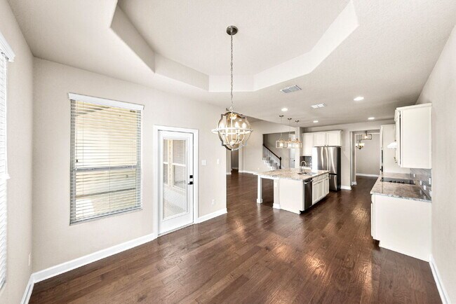 Building Photo - No Rear Neighbors, 3 Car Garage, a Chef's Kitchen, and Room for Everyone