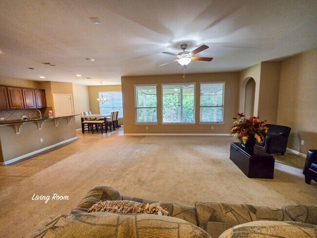 The kitchen and breakfast area boast an open layout that seamlessly blends style and functionality, - 301 Silver Trl