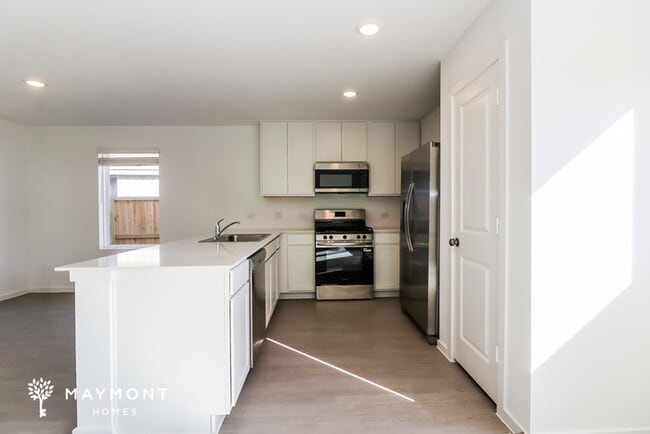 Building Photo - New Home in Sunterra – Enjoy the Beach Lagoon Lifestyle