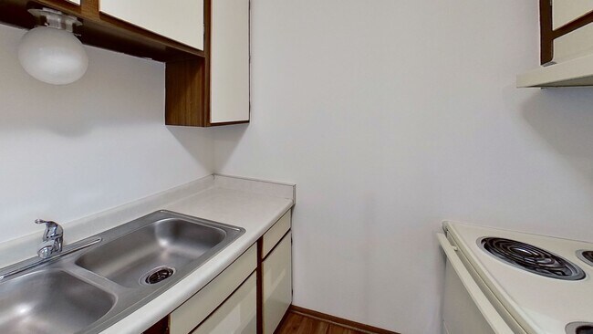 Building Photo - Upper Studio Apartment Available SOON
