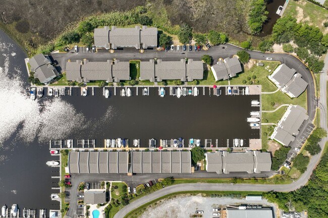 Building Photo - WATERFRONT LIVING! BEAUTIFULLY APPOINTED CONDO ON THE BAYOU IN OS SCHOOL DIST - FULLY FURNISHED