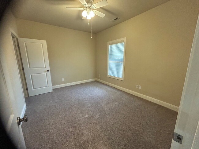 Building Photo - 2BD 2BA GROUND LEVEL DUPLEX WITH GARAGE FO...