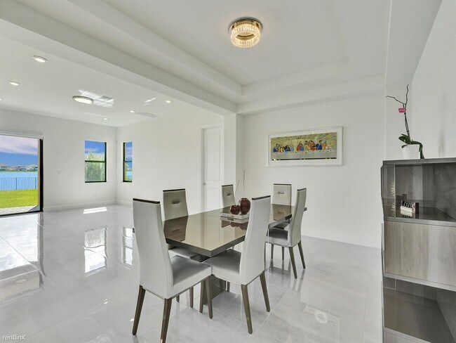 Building Photo - 5 br, 5.5 bath House - 9040 W Parkland Bay...