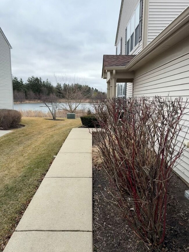 Building Photo - Partially Furnished - Bright & Spacious 2BR/1.5 BA CONDO - End-Unit w/ 2-Car Garage, Appliances, ...