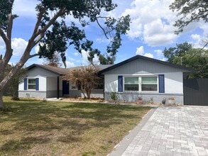 Building Photo - Beautifully Remodeled Lake Front Solar home. Call Sheila Campbell 407-687-7900