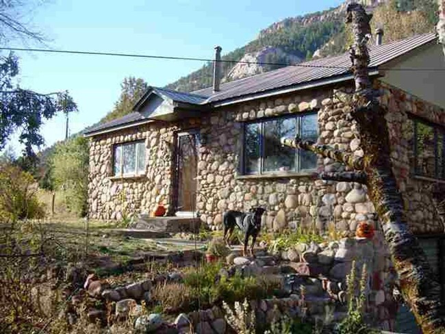 Primary Photo - Charming River Rock House