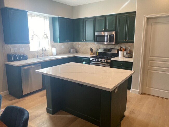 Building Photo - COMING SOON! Spacious 4-Bedroom Townhome w...