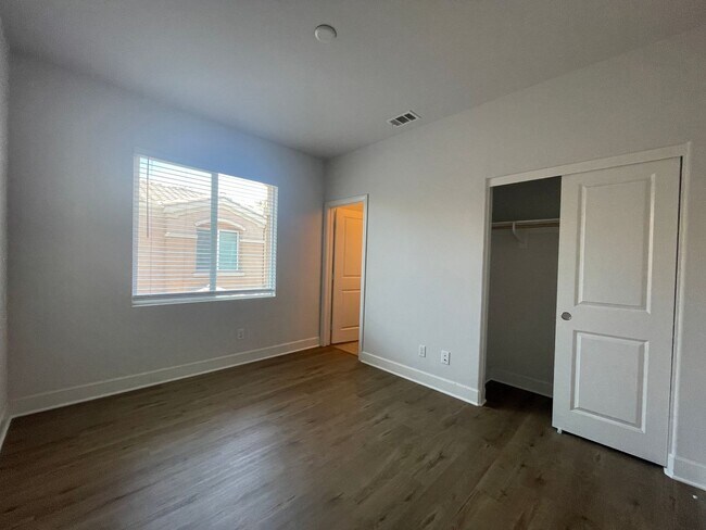 Building Photo - 3 Bed/3 Bath, 2 Garage & 2 Balconies Gated...