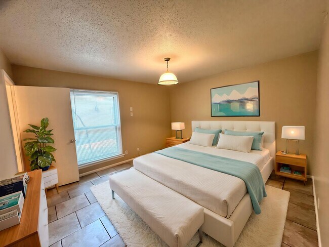 Building Photo - Single-level living on ground floor  |  Fresh paint (July 2026)  |  2 carports  |  Community Pool...