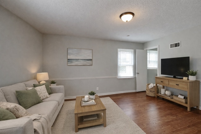 Building Photo - Spacious 4BR Home with Finished Basement, Fireplace & Unique Layout