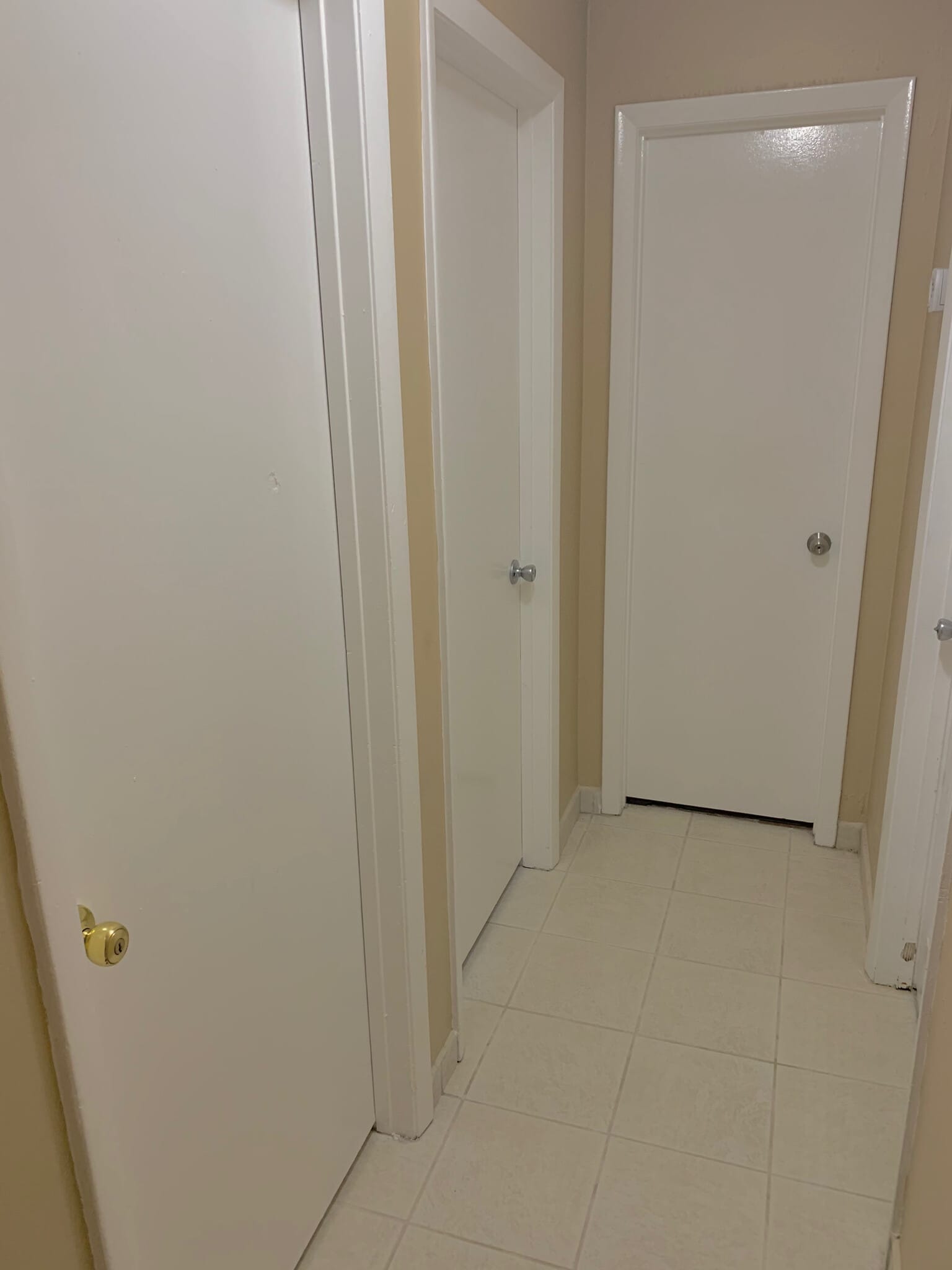 Access Hallway to the Second, Third Bedrooms, Second Bathroom, and Laundry Room Area. - 13566 SW 11th Ln