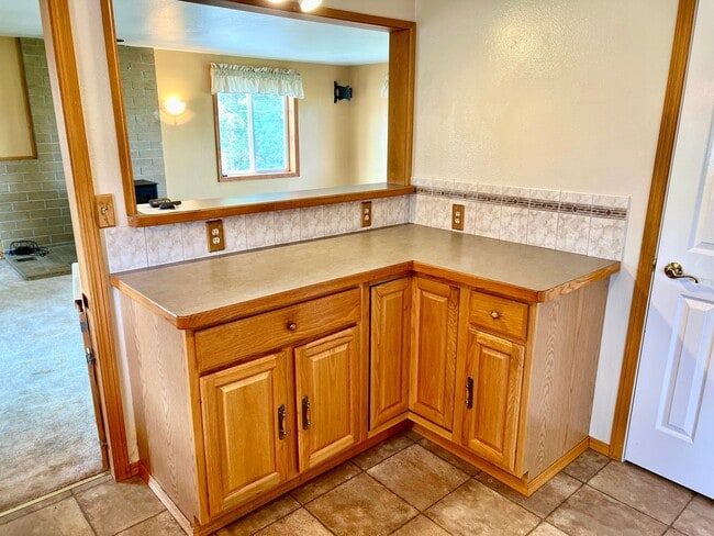 Building Photo - Pet Friendly 2 Bed 2 Bath Single Family Home With Garage, Private Deck and Big Yard!