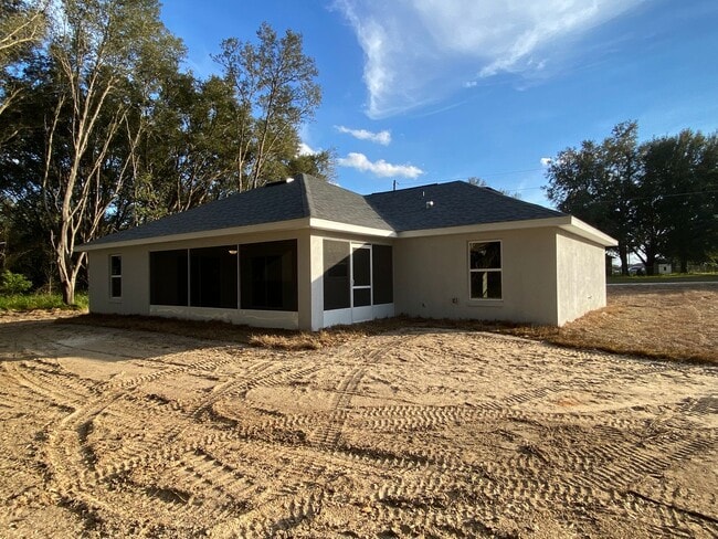 Building Photo - NOT AVAILABLE FOR SHOWING OR MOVE IN UNTIL 09/15/2026!!! Custom Home - Desirable SE Ocala neighbo...
