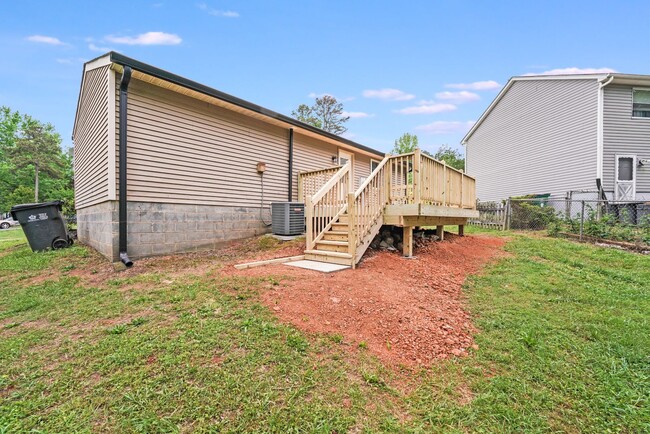 Building Photo - Fully Renovated 2BR Home with New Deck & L...