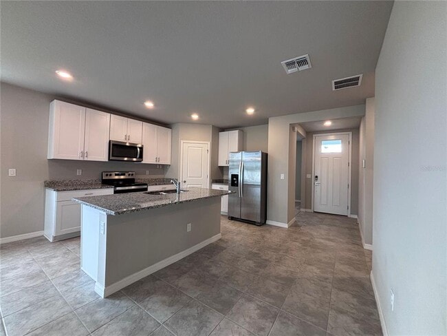 Building Photo - 7009 Feather River Pl