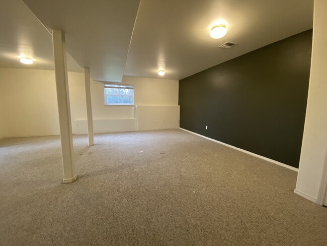 Building Photo - Spacious 4-bedroom with Panoramic Deck Nex...