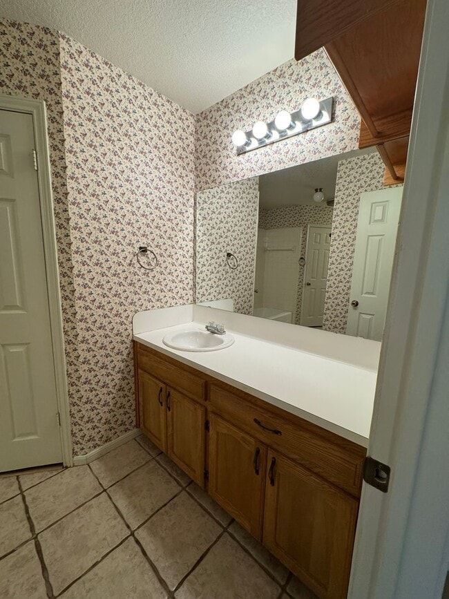 Building Photo - Charming 3-bedroom, 2-bath home offering peaceful country living on just under an acre.