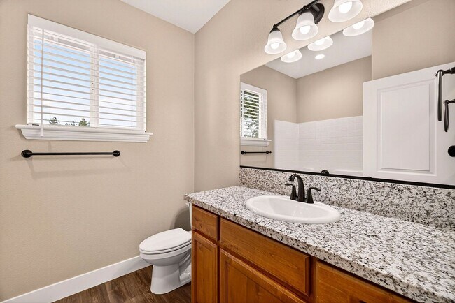 Building Photo - 3-bedroom, 2-bathroom home nestled in the ...