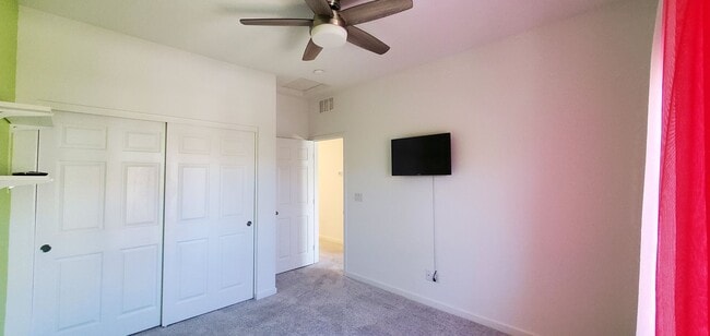 Building Photo - Beautiful townhome features a bright, open-concept layout